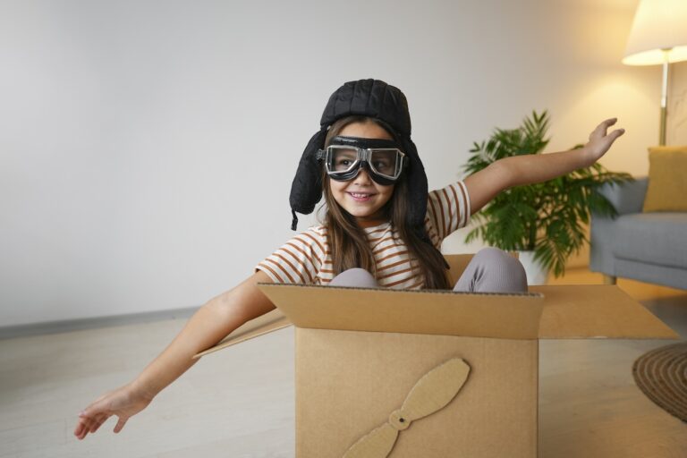 10 Fun Indoor Activities for Kids on a Rainy Day, front-view-girl-playing-with-box