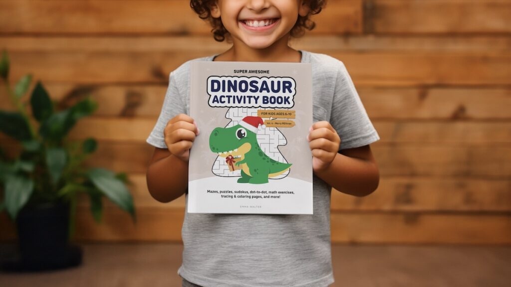 A little boy holding an activity book Super Awesome Dinosaurs Merry REXMas by Emma Walter